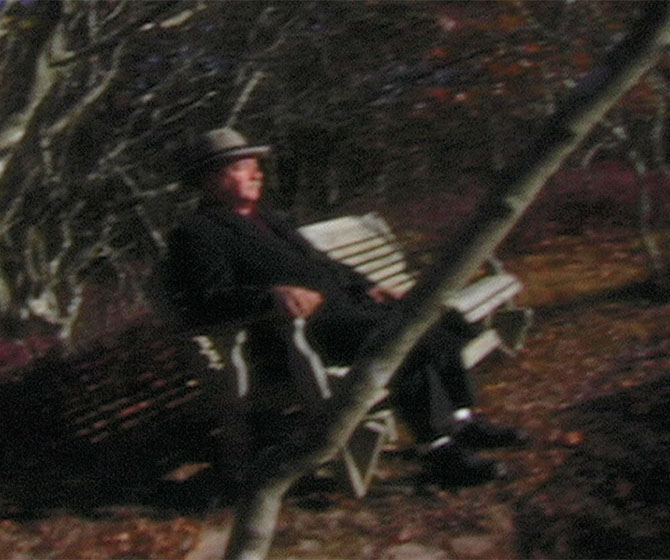 Scene from Caterina Verde's video, "All You Can't Eat and Other Tales of Waiting".&nbsp;&nbsp; Bench at Dusk